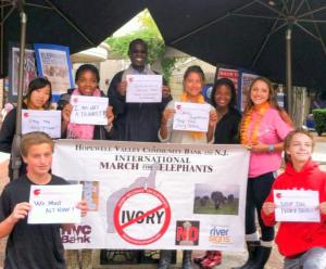 Dr. David Angwenyi and students from Hopewell Valley High School at the Global March for Elephants and Rhinos Princeton Rally on October 4 Image Credit: Kim Robinson